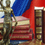 826449 16.12.2010 Статуя Фемиды и юридическая литература на столе в зале судебных заседаний областного суда города Калининграда. Игорь Зарембо/РИА Новости - КПРФ